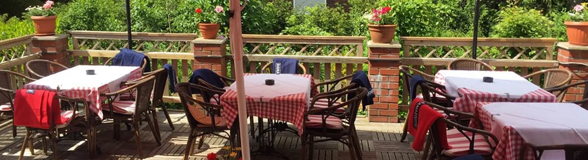 Terrace with red parasols